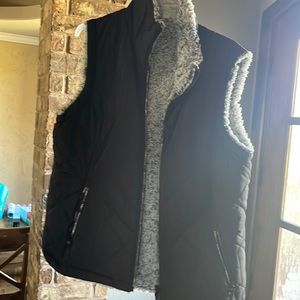 Black vest with zipper pockets